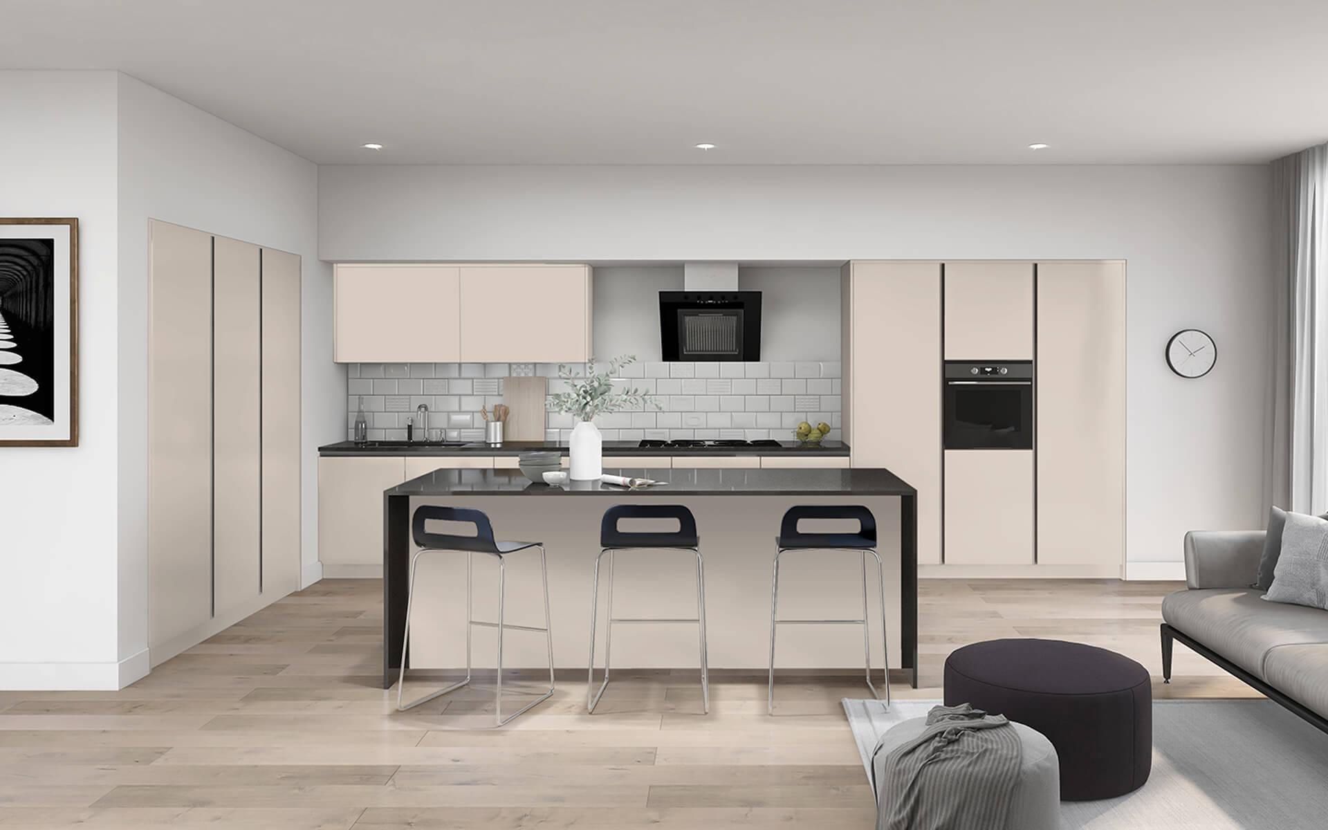 Lucca Kashmir kitchen showing feature island with black worktops, three stools, and tall bank of units with oven