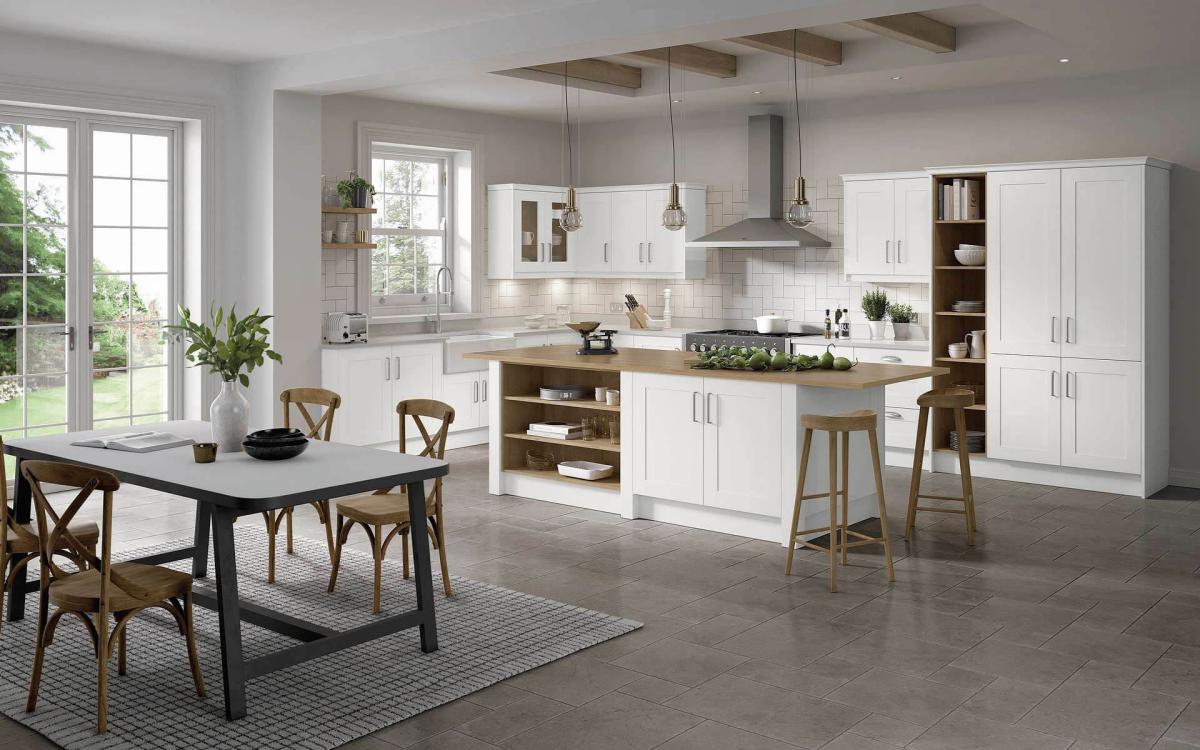 Open plan kitchen and dining area with modern cabinetry in Darlington Taupe style