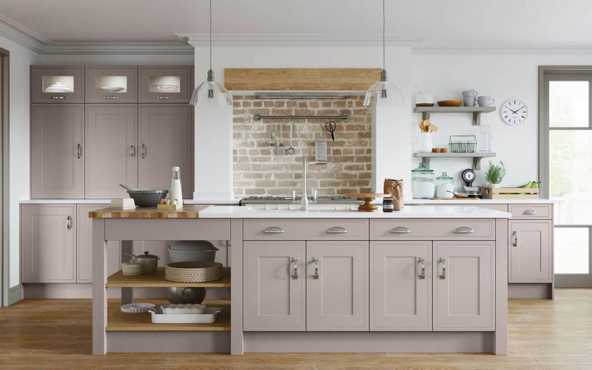 Shaker in-frame effect door style kitchen with island and pastry bench feature in Dewsbury Taupe style