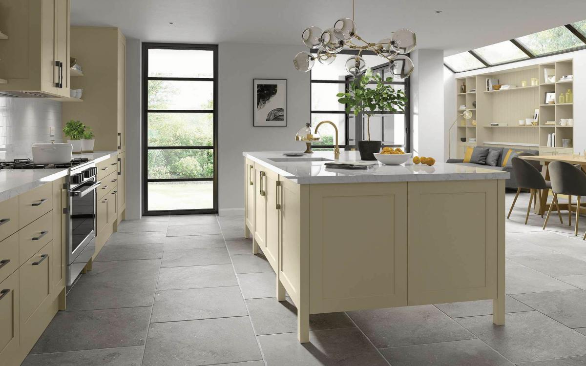 Smooth painted narrow frame shaker door kitchen with large island feature and grey quartz worktops in Millwood Dakar style