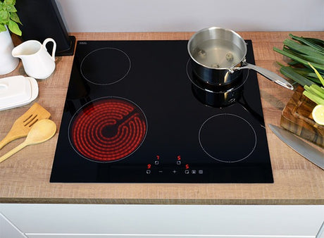 Can I fit an induction hob above a drawer unit?