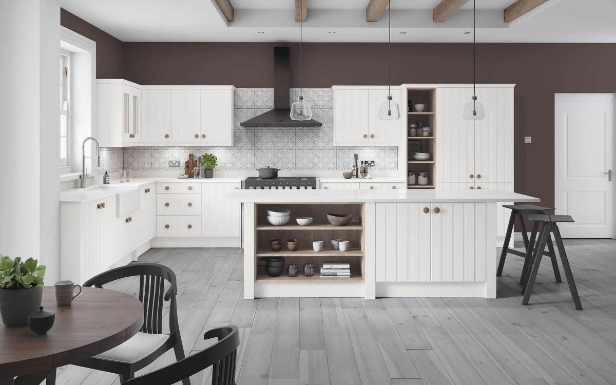 Open plan kitchen with island feature, geometric tiles, and white worktops in St Ives Taupe style