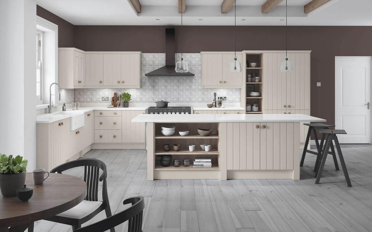 Open plan kitchen with island feature, geometric tiles, and white worktops in St Ives Pebble style