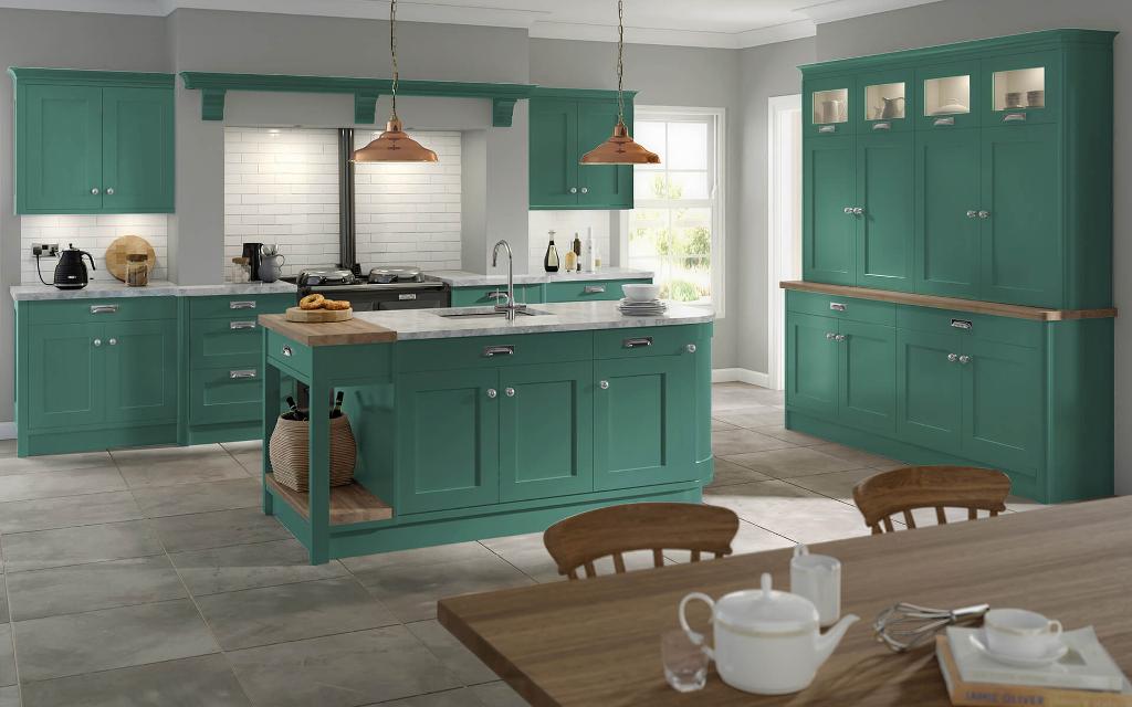 Bewdley Liberty Green kitchen with wall cupboards on either side of the chimney breast.